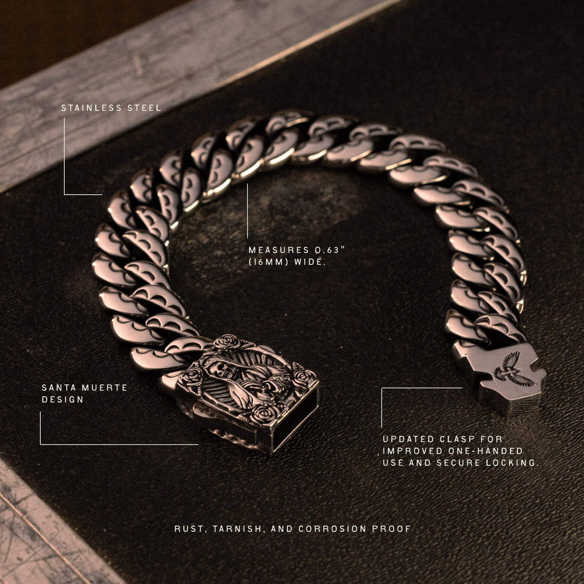 Stainless steel chain bracelet with decorative clasp featuring Santa Muerte design, 0.63" wide.