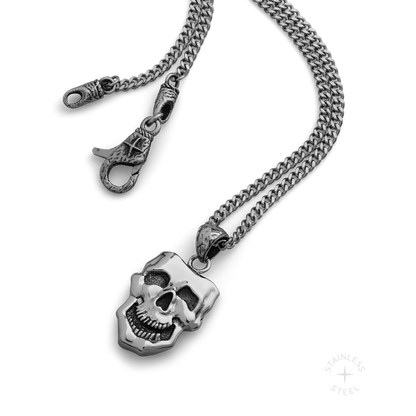 stainless steel pendant with double sided skull design inspired by comedy and tragedy masks