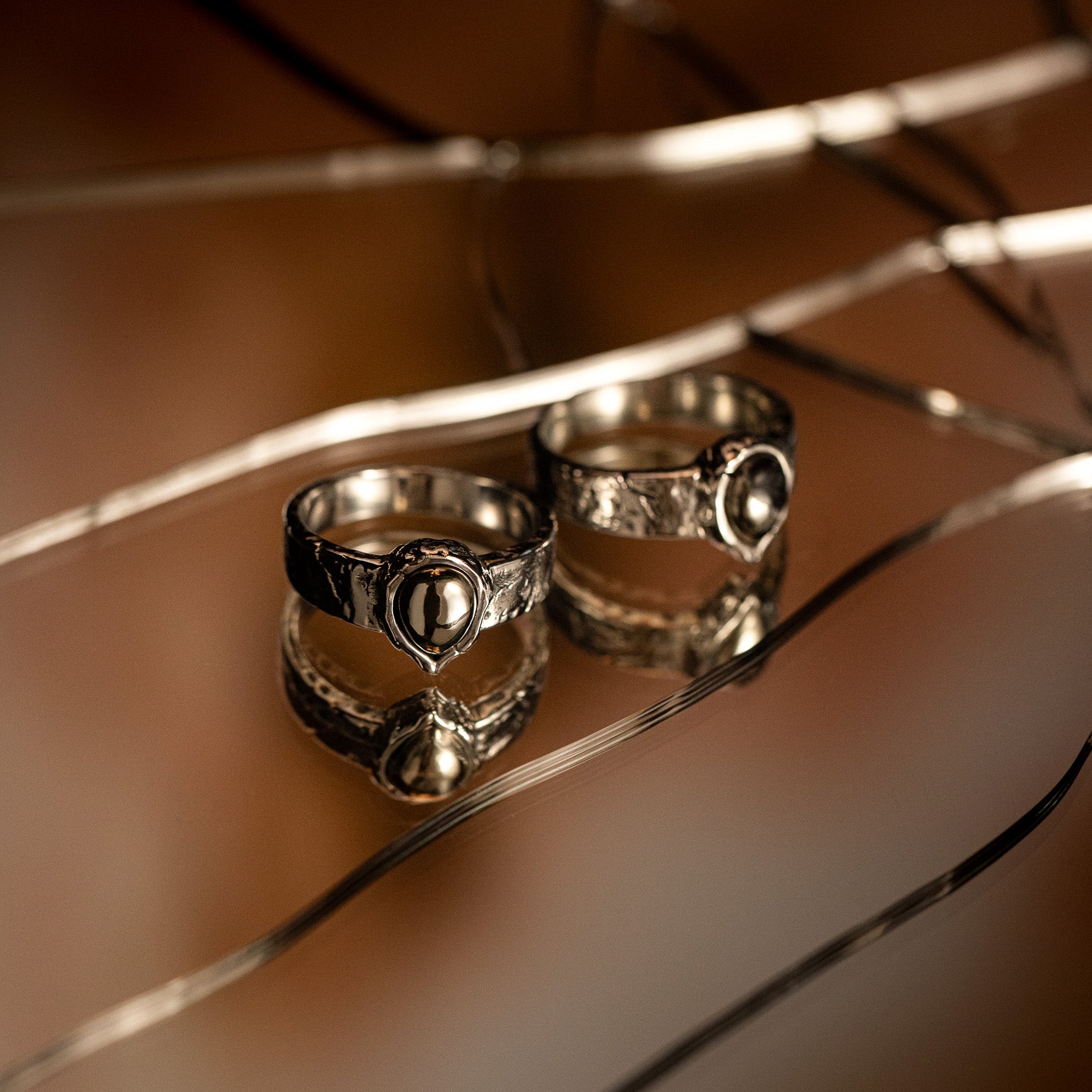 Underburn sterling silver and apache gold stone teardrop band ring