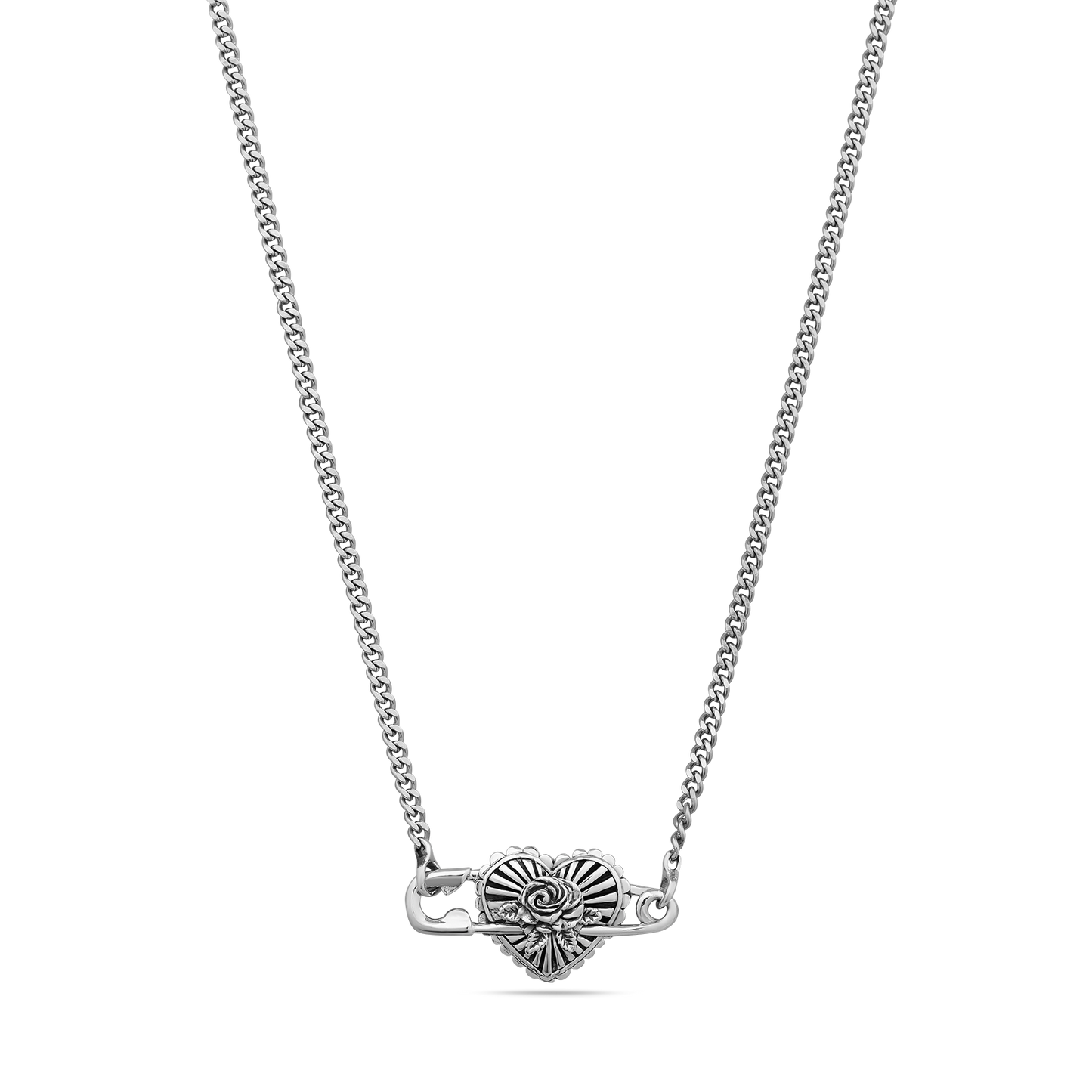 Silver-tone necklace with decorative heart-shaped pendant featuring spiral detailing on curb chain.
