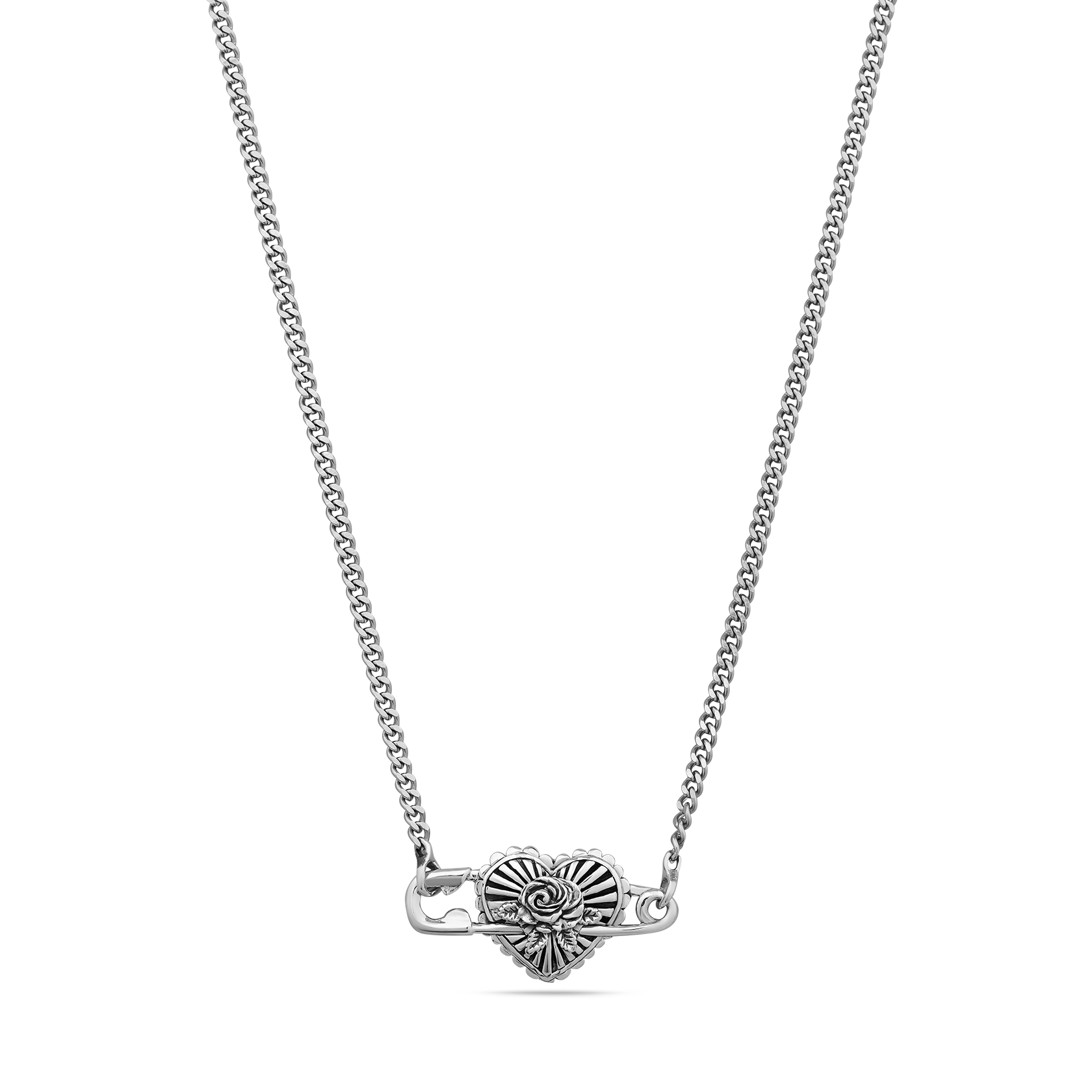 Silver-tone necklace with decorative heart-shaped pendant featuring spiral detailing on curb chain.