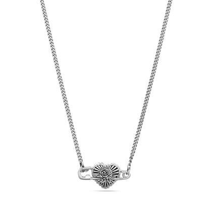 Silver-tone necklace with decorative heart-shaped pendant featuring spiral detailing on curb chain.