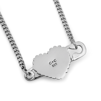 Silver chain necklace with scalloped cloud-shaped pendant stamped with "C+C 925" and hook clasp details.