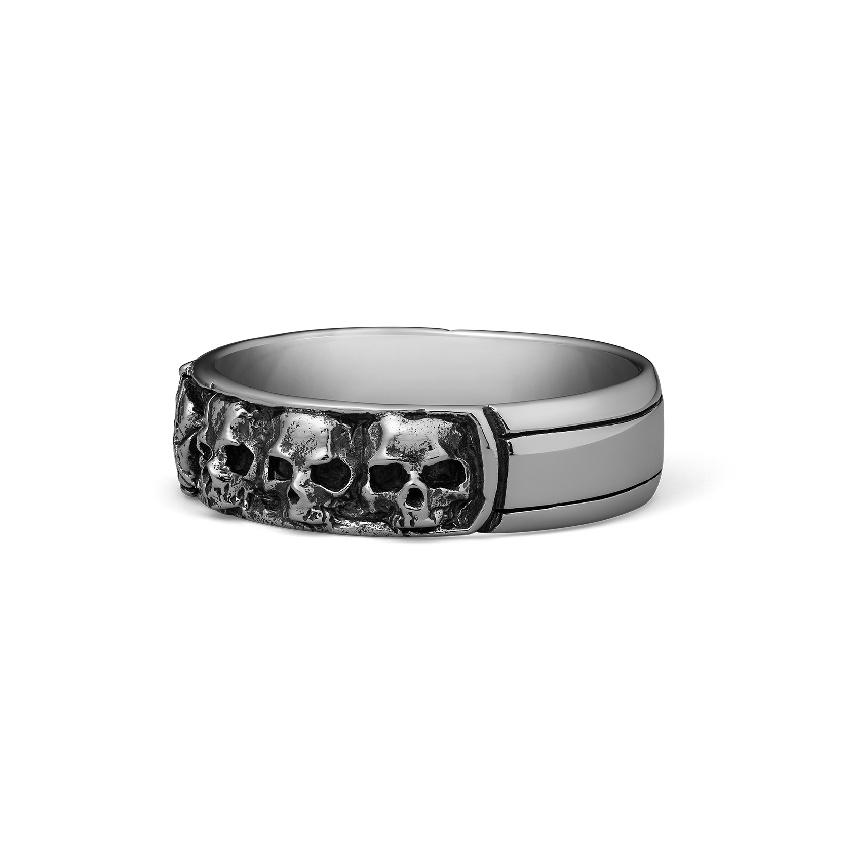 Silver-toned ring with multiple skull motifs on the front band and polished sides.