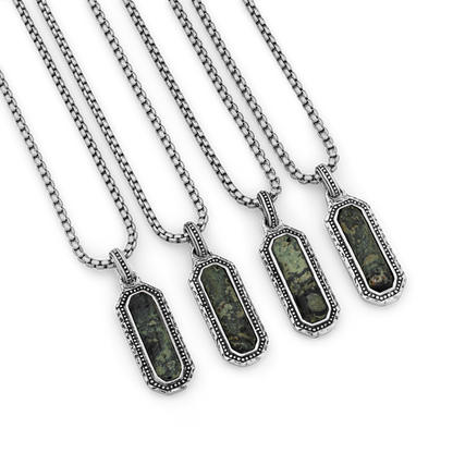 Four silver-tone pendant necklaces with dark green Kambaba Jasper stone inlays in ornate rectangular bezels on box chain link