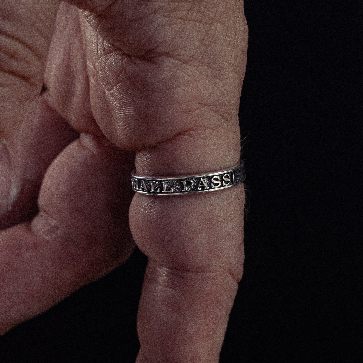 This Too Shall Pass sterling silver ring - on figure