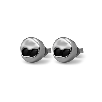 set of two Sterling silver stud earrings with sunken Black Onyx stones set in a rounded, polished form