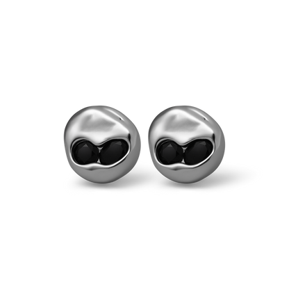 set of two Sterling silver stud earrings with sunken Black Onyx stones set in a rounded, polished form